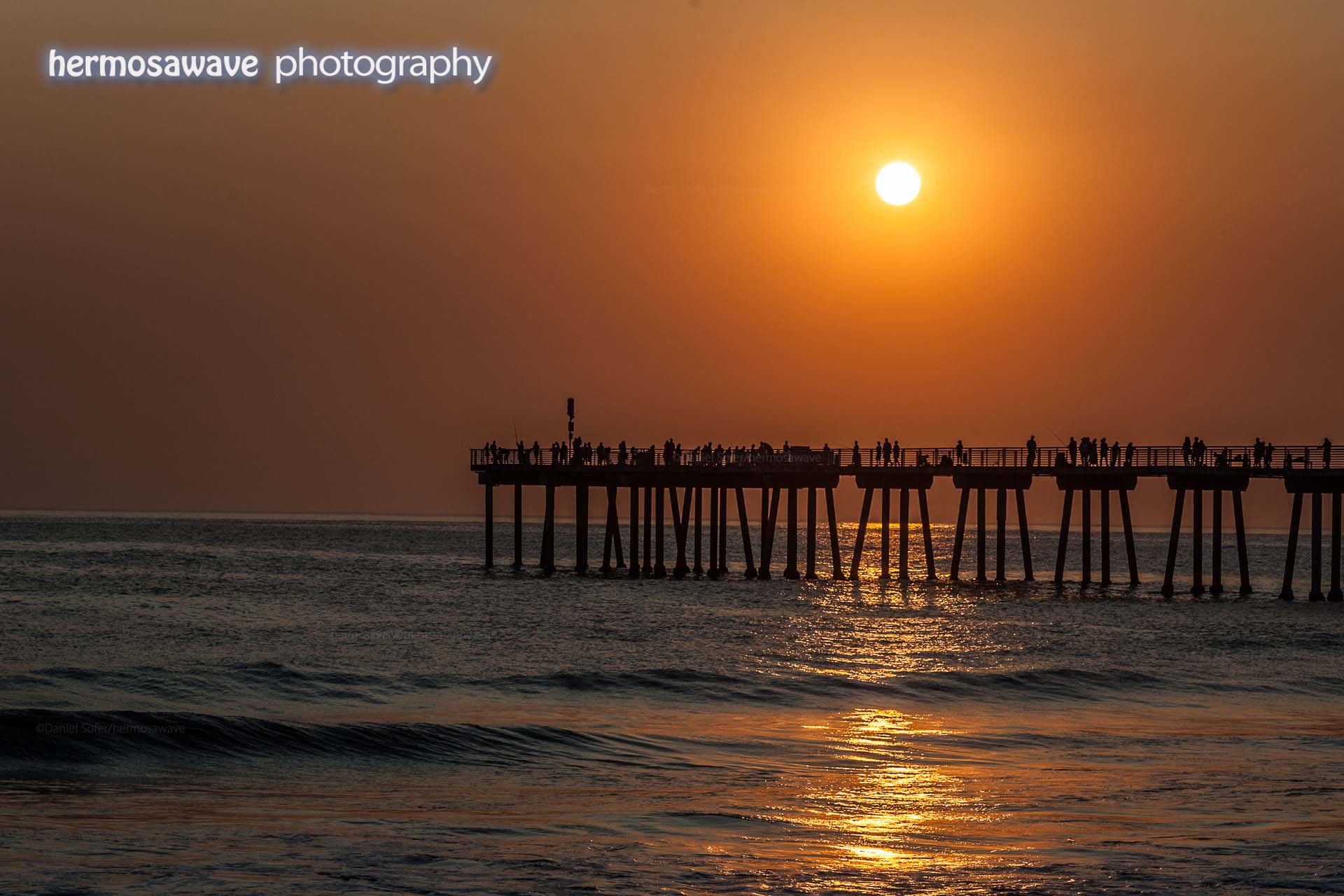 Hazy Sunset Over the Pier